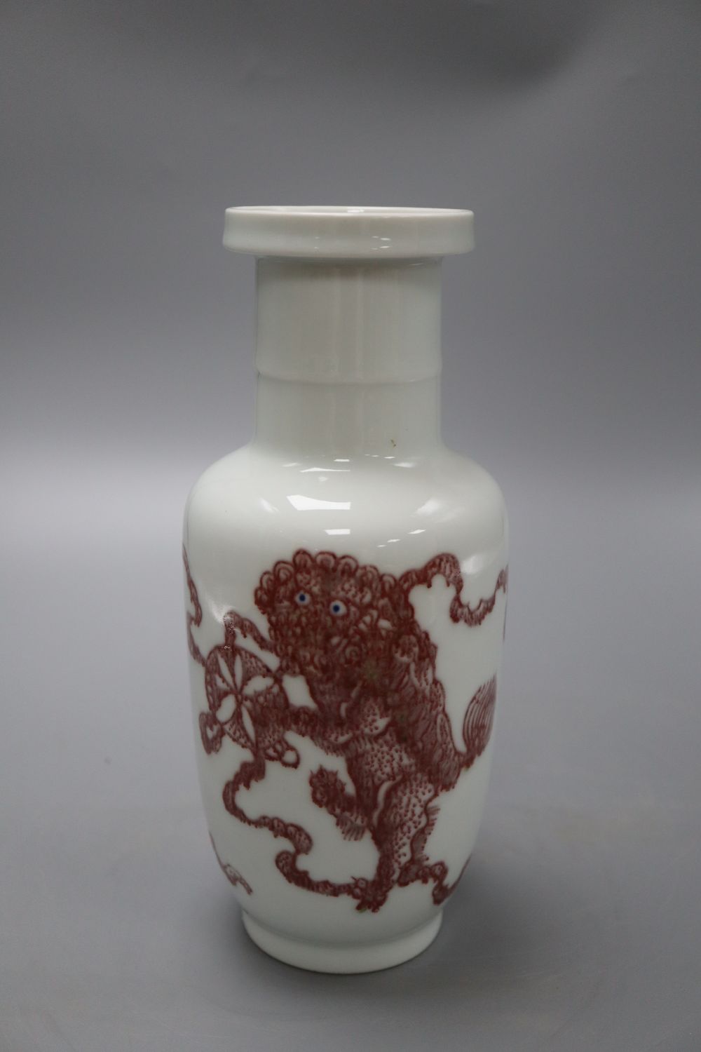 A Chinese underglaze copper red rouleau vase, height 24cm